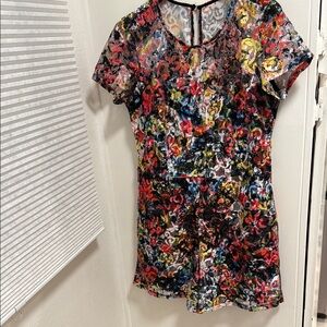 Jumpsuit Short sleeves. Perfect for any occasion. Zipper back. Lined. Size 10